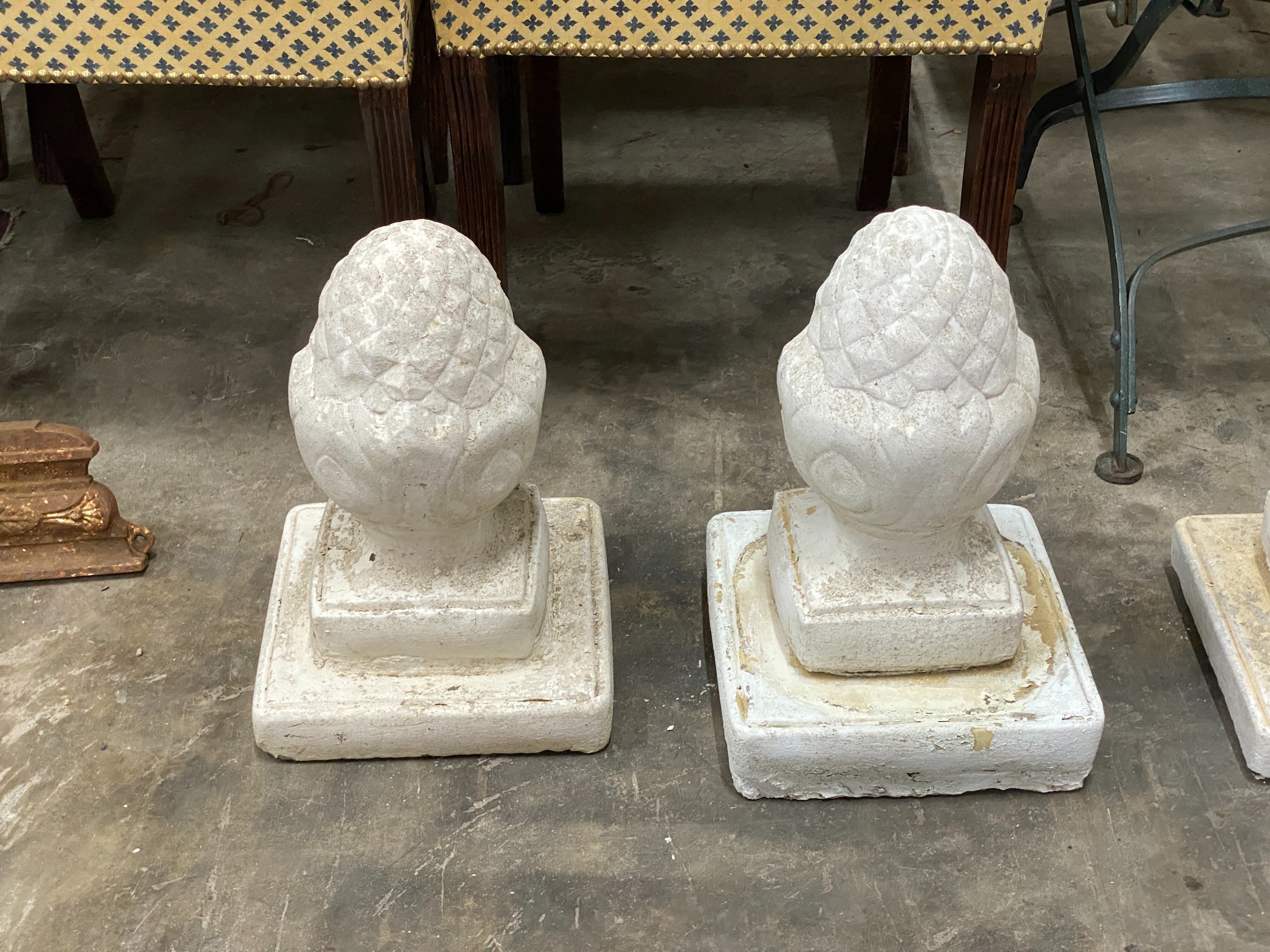 A set of six painted reconstituted stone garden acorn finials, height 36cm